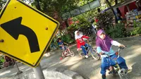 Sejak hari kedua Lebaran, para pengunjung memenuhi Taman Lalu Lintas di Kota Bandung, Jawa Barat. (Liputan6.com/Aditya Prakasa)