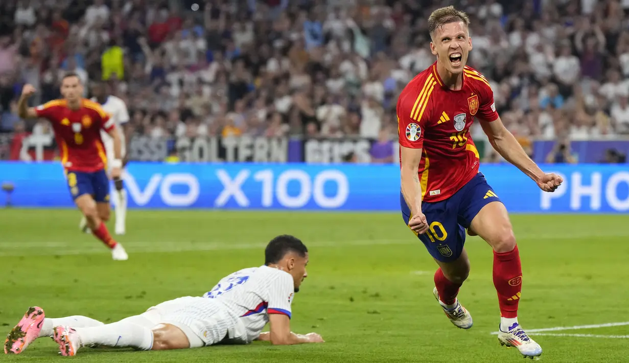 Penyerang Spanyol Dani Olmo merayakan gol kedua timnya yang dicetak ke gawang Prancis pada semifinal  Euro 2024 di Allianz Arena, Munchen, Rabu (10/7/2024) dini hari WIB. (AP Photo/Manu Fernandez)