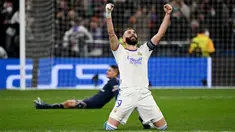Real Madrid melakukan epic comeback saat mendepak Paris Saint-Germain (PSG) pada 16 besar Liga Champions 2021/2022. (AFP/Gabriel Bouys)