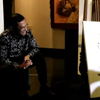 Gitaris band Blackout yaitu Ega Liong terinspirasi menciptakan melodi lagu setelah terinspirasi sebuah lukisan. (Ruwanto/Bintang.com)