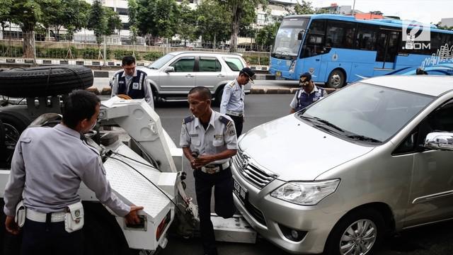 Pemprov DKI Jakarta akan mewajibkan setiap pemilik mobil untuk memiliki garasi