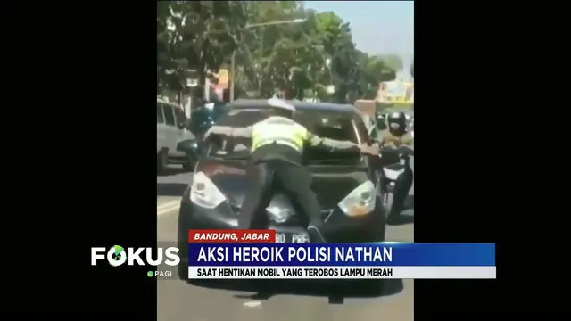Viral polisi lalu lintas bernama Brigadir Nathan hentikan mobil berplat Jakarta saat menerobos lampu merah layakanya Spider-Man.