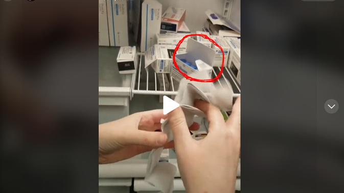 Cek Fakta  menelusuri klaim klaim video kemasan vaksin hanya berisi kertas