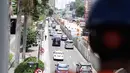Jalan MH Thamrin terlihat lebih sepi tanpa sepeda motor yang melintas, Jakarta, Rabu (17/12/2014). (Liputan6.com/Faizal Fanani)