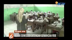 Banjir rob setinggi 20 hingga 50 sentimeter yang menggenangi kawasan ini sejak Jumat pekan lalu tak kunjung surut.