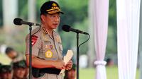 Kapolri Jenderal Tito Karnavian memberi sambutan saat memimpin Apel Kesiapan Natal, Tahun Baru dan Pemilu 2019, Jakarta, Jumat (30/11). Apel diikuti 50.000 personel dari AD, AL, AU, dan Polri. (Liputan6.com/Johan Tallo)