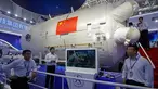 Sebuah model stasiun luar angkasa China ditampilkan dalam Pameran Penerbangan dan Antariksa Internasional ke-12 China atau Airshow China 2018 di Kota Zhuhai, Provinsi Guangdong, Rabu (7/11). (AP Photo/Kin Cheung)