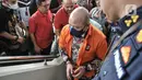 Tersangka Irjen Pol Teddy Minahasa saat tiba untuk pelimpahan tahap II kasus narkoba di Kejaksaan Negeri Jakarta Barat, Rabu (11/1/2023). Eks Kapolda Sumatera Barat tersebut hanya diam saja ketika awak media bertanya mengenai kasus yang menjeratnya.. (merdeka.com/Iqbal S Nugroho)