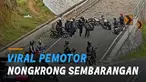 Sejumlah pemotor tampak santai nongkrong di sebuah jalur penyelamat.