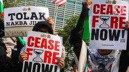Aksi damai memperingati Nakba ke 76 tahun tersebut bertajuk "MELAWAN KEJAHATAN APARTHEID ZIONIS ISRAEL". (Liputan6.com/Angga Yuniar)