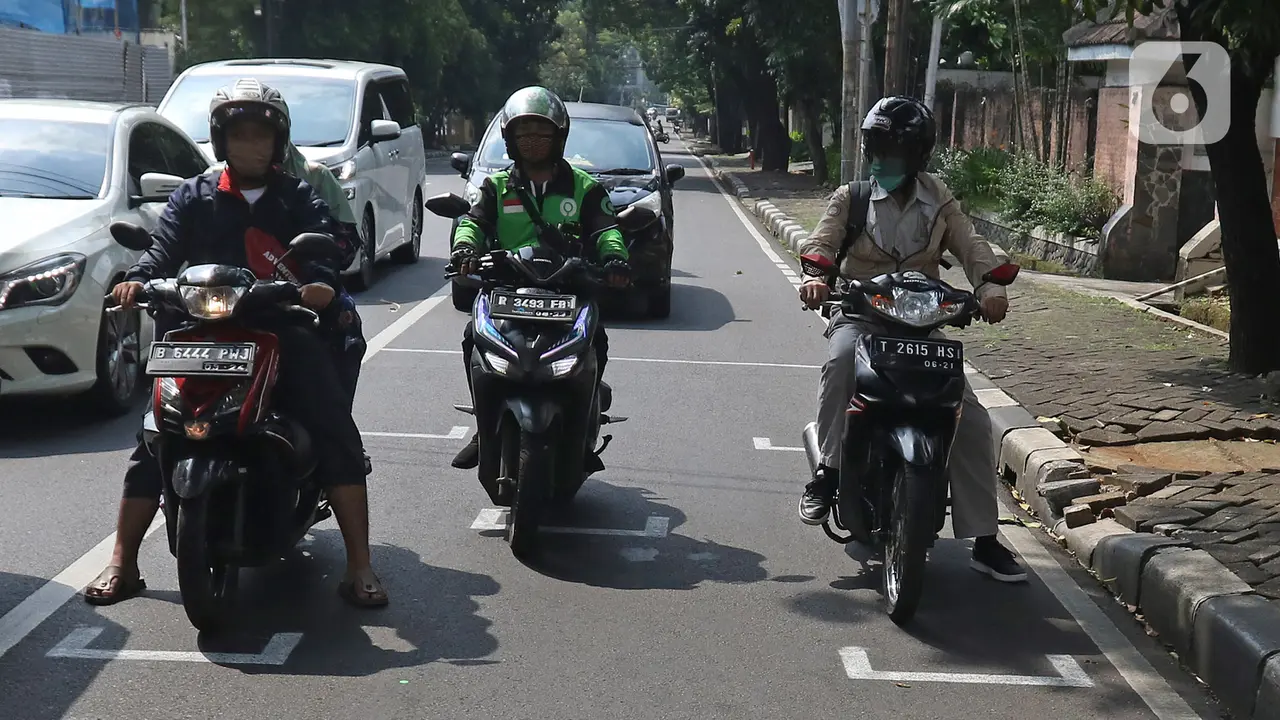 FOTO: Garis Pembatas Antarpengendara Motor di Jakarta