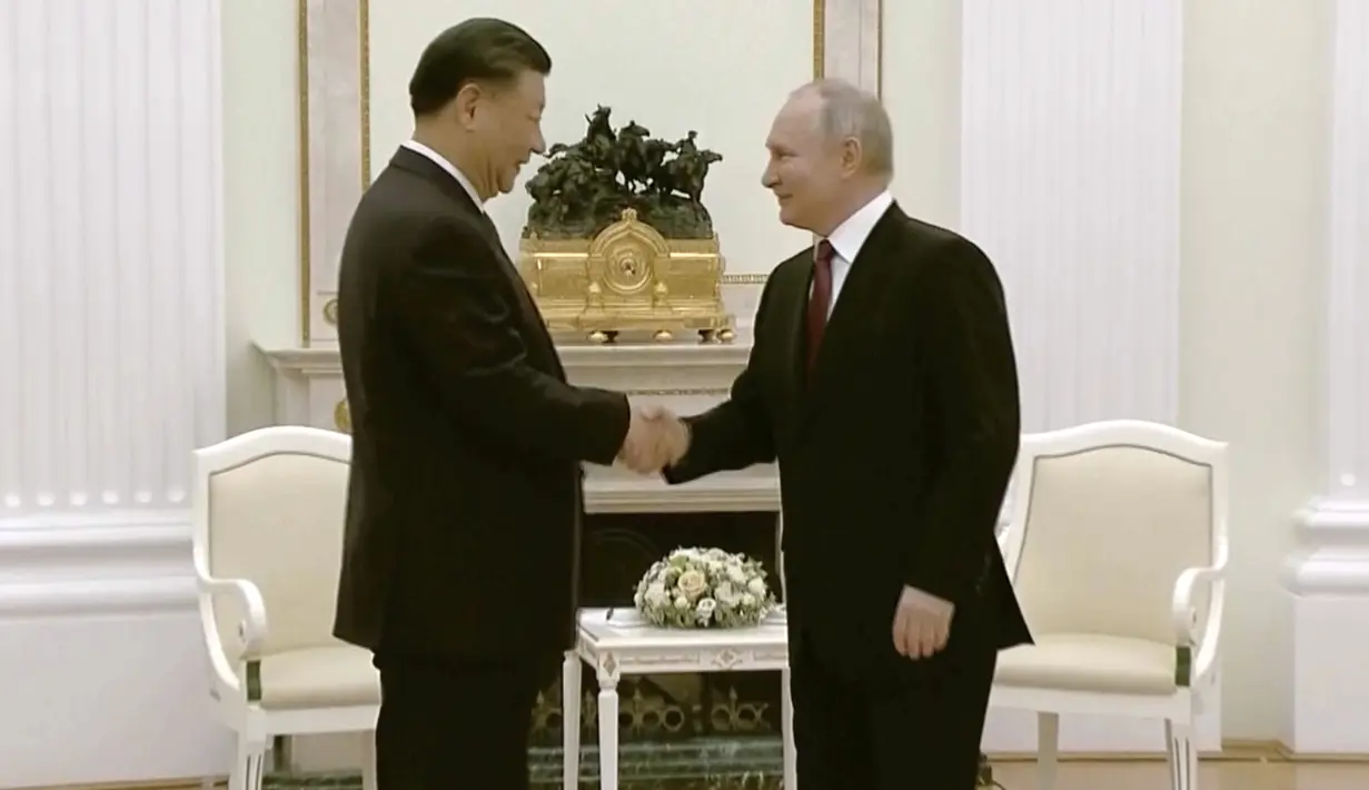 Xi Jinping mengatakan, kunjungan kenegaraannya yang berlangsung selama tiga hari ke Rusia akan memberikan momentum baru dalam hubungan bilateral. (Russian Pool via AP)