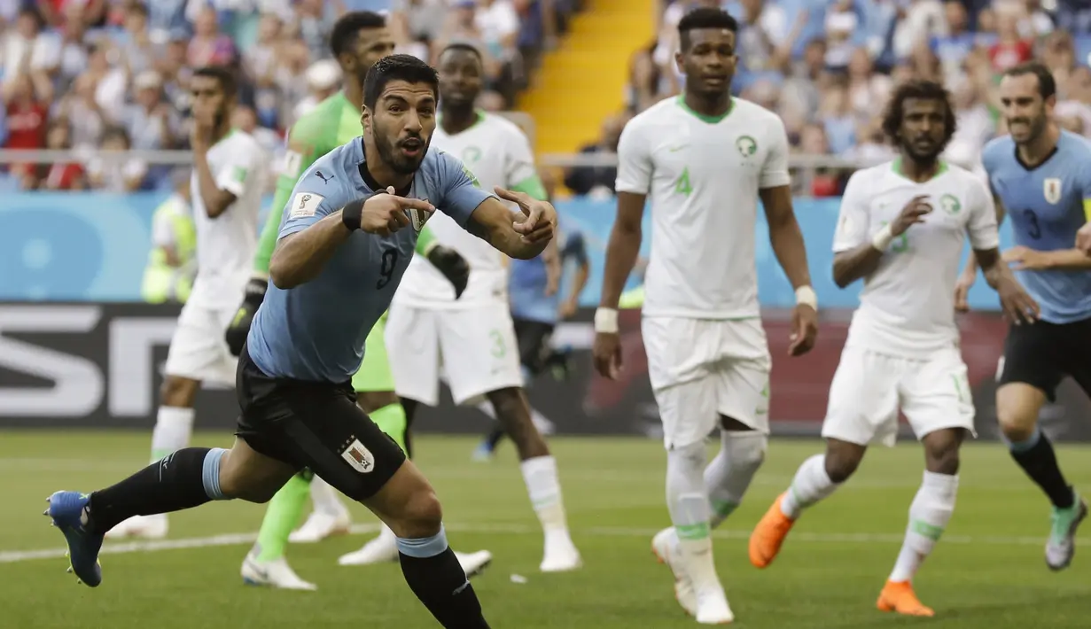 Pemain Uruguay, Luis Suarez merayakan gol ke gawang Arab Saudi pada laga grup A Piala Dunia 2018 di Rostov Arena, Rostov-on-Don, Rusia, (20/6/2018). Uruguay menang 1-0. (AP/Andrew Medichini)