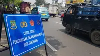 Selama pemberlakuan Pembatasan Sosial Berskala Besar atau PSBB di Tangerang, ternyata tidak akan ada sanksi tilang bagi para pengendara yang melanggar. (Foto: Liputan6/Pramita)