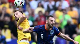 Kemenangan atas Rumania memastikan Belanda berlaga di babak delapan besar Euro 2024. (Fabrice COFFRINI/AFP)