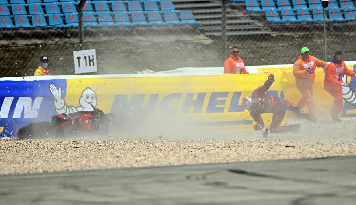 <p>Insiden itu terjadi di tengah-tengah balapan saat Miller dan Mir serta Johann Zarco terlibat duel perebutan posisi kedua di belakang Fabio Quartararo. (AFP/Patricia De Melo Moreira)</p>
<p> </p>