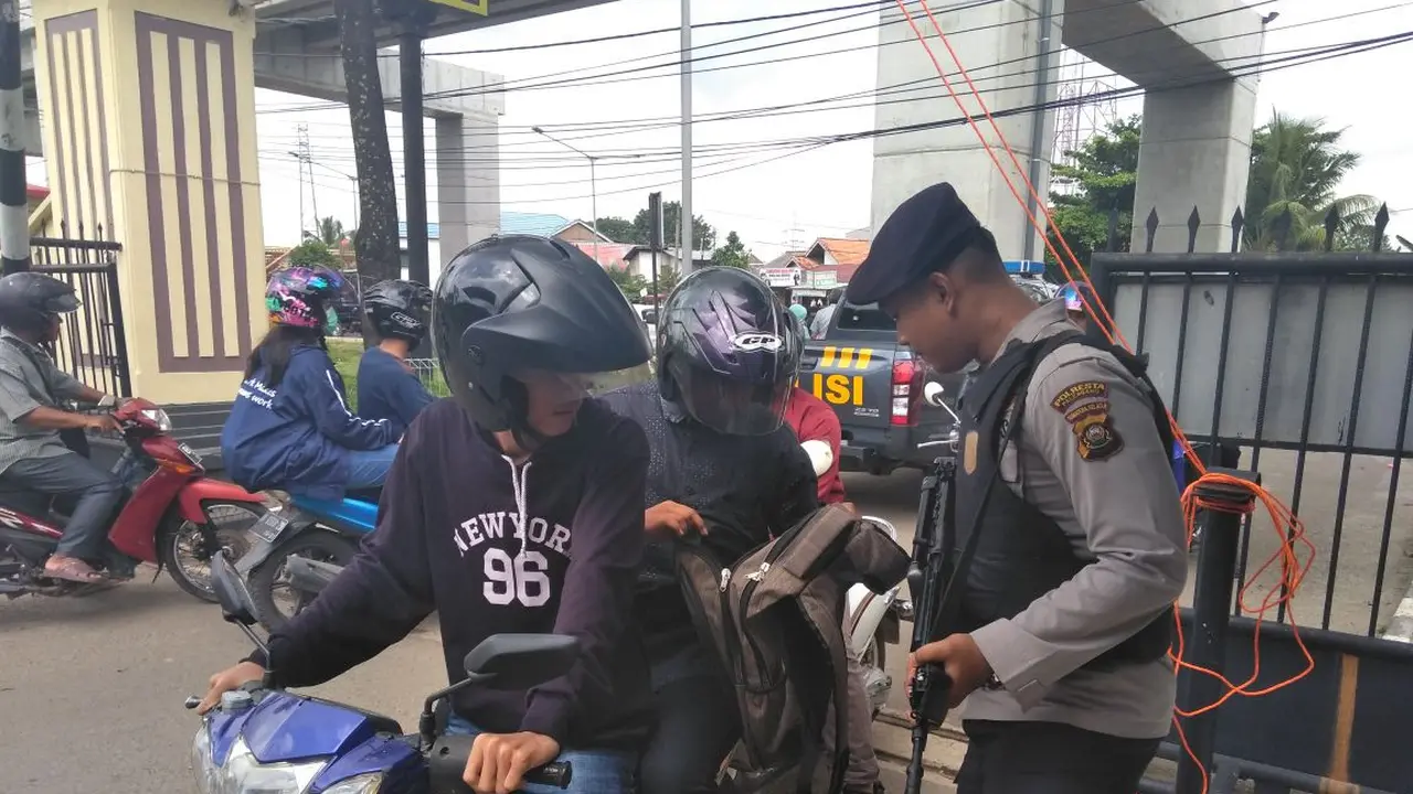 Mapolda Sumsel Dikawal Polisi Berompi Antipeluru Pasca Bom Surabaya