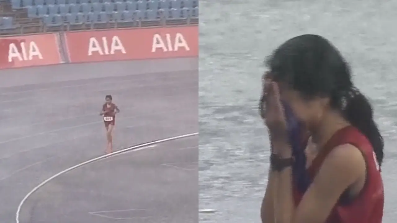 Bou Samnang, pelari Kamboja di ASEAN Games 2023. Ia terus berlari meski hujan. Setelah mencapai garis finish, ia menangis sambil mencium bendera negaranya.