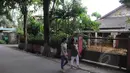Salah satu perusahaan pemenang tender pengadaan uninterruptible power supply (UPS) untuk SMAN 2 Jakarta, PT Barkanatas Dharma ternyata adalah sebuah rumah tak berpenghuni. Foto diambil pada Minggu (1/3/2015). (Liputan6.com/Herman Zakharia)