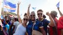 Suka cita menyelimuti rakyat Cape Verde setelah timnas mereka berhasil mencetak sejarah dengan lolos ke Piala Dunia 2026. Ini merupakan kali pertama negara kepulauan di Afrika Barat itu tampil di ajang Piala Dunia. (AFP/Queila Fernandes)