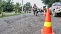 Jalan Poros Trans Batumarta Unit 2, Kecamatan Lubuk Raja, Kabupaten Ogan Komering Ulu (OKU), Sumatera Selatan. (Dok Kementerian PUPR)