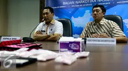 Ketua BNN, Budi waseso memberikan keterangan saat rilis di kantor BNN, Jakarta, Selasa (27/10/2015). BNN mengamankan empat tersangka kasus narkoba dengan barang bukti 1000 butir pil ekstasi, dua diantaranya merupakan oknum TNI. (Liputan6.com/Yoppy Renato)