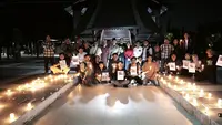Nyala Lilin dan Doa untuk Jurnalis Hilang Kontak