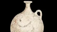 Gambar emoji senyum pada vas kuno yang ditemukan di Turki. (Doc: CEN)