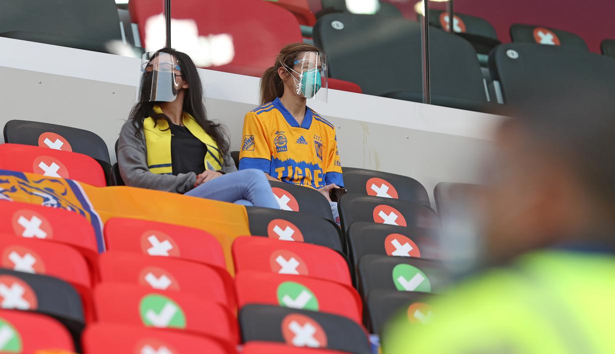 Pada laga pembuka, terdapat pertarungan sengit antara wakil zona Concacaf, Tigres UANL (Meksiko), menghadapi perwakilan zona Asia yakni Ulsan Hyundai (Korea Selatan). (Foto: AFP/Karim Jaafar)