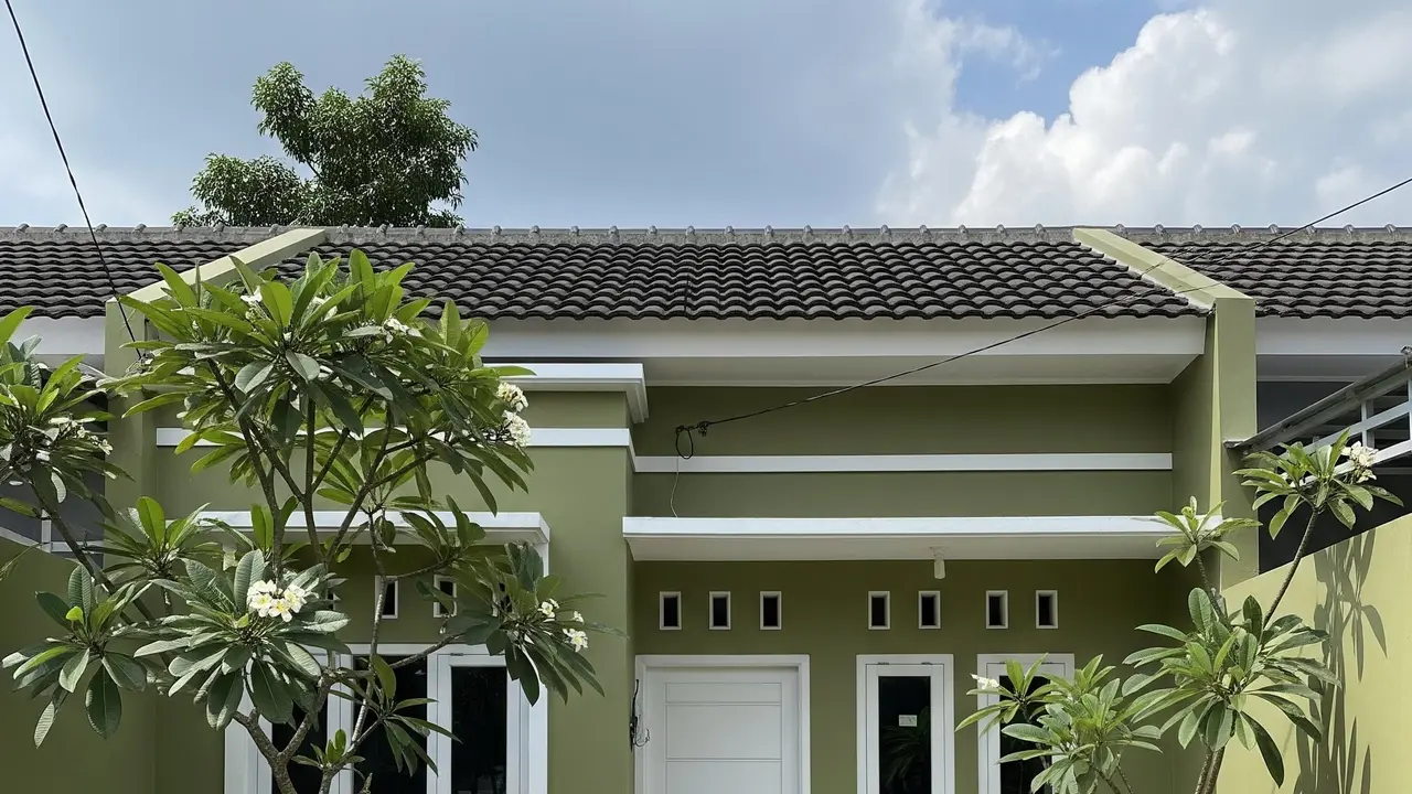 Rumah Sederhana Warna Hijau Elegan di Lahan Terbatas