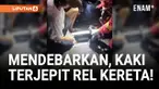 Seorang wisatawan asal Gunung Putri, Kabupaten Bogor, terjebak di celah rel antara Stasiun Bogor dan Paledang, Minggu malam (14/7). Kaki kanan korban, Rifki (23), tersangkut selama 30 menit akibat terperosok di antara besi rel dan bak kontrol saat be...
