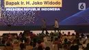 Presiden Joko Widodo bersiap memberikan pandangan terkait ekonomi dalam Pertemuan Tahunan Bank Indonesia (PTBI) 2019 di Jakarta, Kamis (28/11/2019). Acara bertema 'Sinergi Transformasi Inovasi Menuju Indonesia Maju' ini dihadiri para pelaku industri keuangan. (Liputaan6.com/Angga Yuniar)