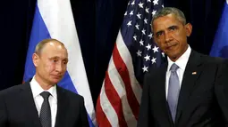 Presiden AS, Barack Obama dan Presiden Rusia, Vladimir Putin saat bertatap muka pada Sidang Umum PBB di New York, Senin (28/9/2015). (REUTERS/Kevin Lamarque)