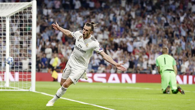 Penyerang Real Madrid, Gareth Bale, melakukan selebrasi. (AP/Manu Fernandez)
