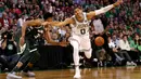 Pebasket Boston Celtics, Jayson Tatum, gagal merebut bola saat melawan Milwaukee Bucks pada laga NBA di TD Garden, Boston, Rabu (18/10/2017). Celtics kalah 100-108 dari Bucks. (AFP/Maddie Meyer)