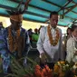 Presiden Jokowi dan Ibu Negara Iriana Jokowi Saat Berkunjungi ke Pasar Irai, Kabupaten Pegunungan Arfak, Papua Barat, Minggu (27/10/2019). (Foto: Lizsa Egeham/Liputan6.com)