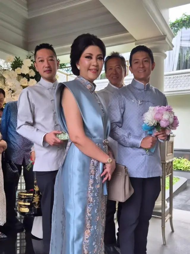 6 Potret Tampilan Gagah Pembalap Rio Haryanto Dibalut Baju Cheongsam saat Lamar Keponakan Sandiaga Uno, Disebut Hari Patah Hati Nasional