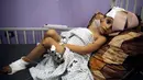 Menurut laporan Al Jazeera, korban tewas imbas serangan Israel di Gaza mencapai 10.022. Dari jumlah tersebut, 4.104 di antaranya merupakan anak-anak. (AP Photo/Abdel Kareem Hana)