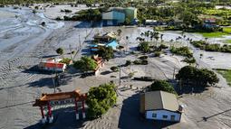 Foto udara menunjukkan sebagian wilayah Kota Guangfu terendam banjir setelah danau penghalang meluap di Hualien pada Kamis 25 September 2025, menyusul hujan deras ketika Topan Super Ragasa melanda Taiwan. (I-Hwa Cheng/AFP)