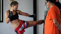 Ilustrasi orang latihan muay thai. (Foto: Unsplash/Jonathan Tomas)