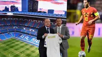 Gelandang Real Madrid, Eden Hazard, bersama presiden Florentino Perez saat perkenalan dirinya di Stadion Santiago Bernabeu, Madrid, Kamis (13/6). Dirinya didatangkan Madrid dari Chelsea dengan kontrak lima musim. (AFP/Gabriel Bouys)