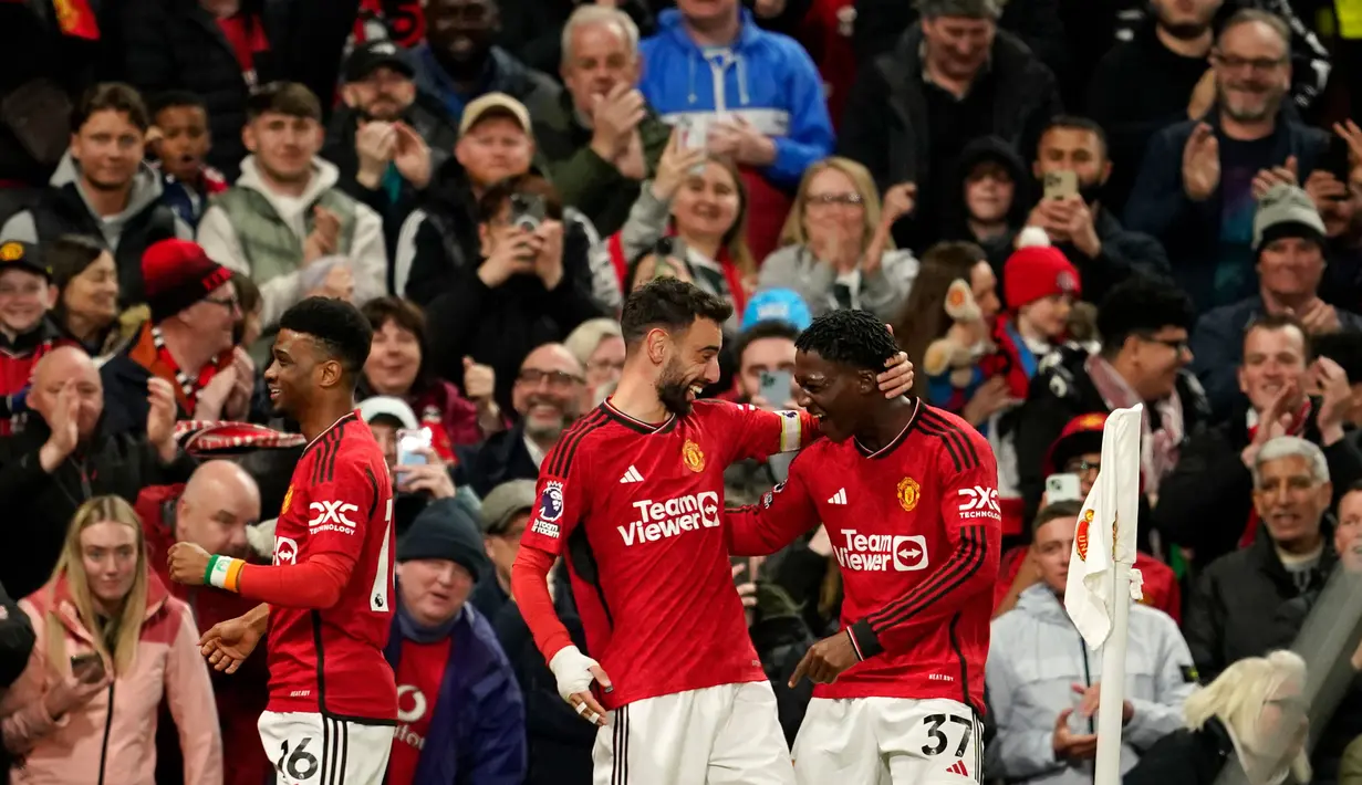 Berlaga di markas sendiri, Manchester United berhasil membukukan kemenangan 4-2 atas Sheffield United. (AP Photo/Dave Thompson)