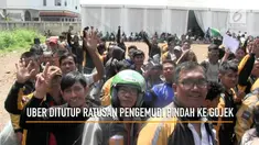 Ratusan mitra pengemudi Uber memadati kantor Gojek di Kemang Jakarta Selatan. Pascapenutupan Uber karena diakuisisi Grab ratusan pengemudi ini pindah ke Gojek