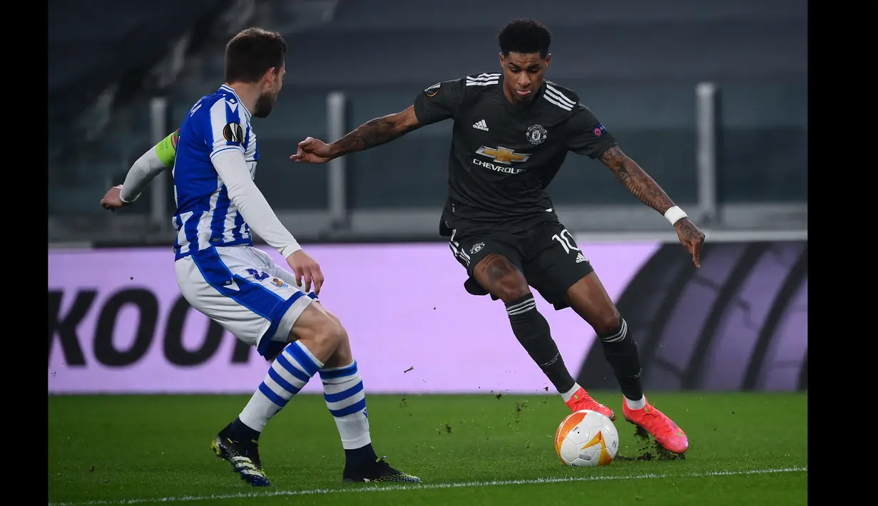 MU memperbesar keunggulan pada menit ke-64 lewat aksi Marcus Rashford. Umpan dari Fred mampu dituntaskan Rashford menjadi gol dengan tendangan kaki kanan. (Foto: AFP/Marco Bertorello)