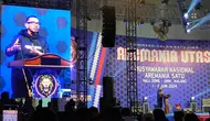 Anggota Komite Eksekutif (Exco) PSSI, Arya Sinulingga saat pidato pembukaan&nbsp;Musyawarah Nasional Aremania Satu di Dome Universitas Muhammadiyah Malang, Sabtu, 1 Juni 2024 (Liputan6.com/Zainul Arifin)&nbsp;