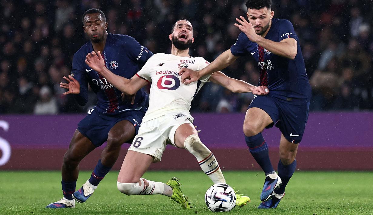 Lille harus merasakan kekalahan saat bertandang ke markas Paris Saint-Germain dalam laga lanjutan Liga Prancis 2025/2026 di Parc Des Princes, Paris, Prancis, Jumat (16/01/2026) waktu setempat. (AFP/Anne-Christine Poujoulat)