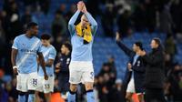 Striker Norwegia Manchester City #09, Erling Haaland, bertepuk tangan kepada para penggemar setelah pertandingan Liga Inggris antara Manchester City dan Wolverhampton Wanderers di Stadion Etihad di Manchester, barat laut Inggris, pada 24 Januari 2026. (Darren Staples/AFP)