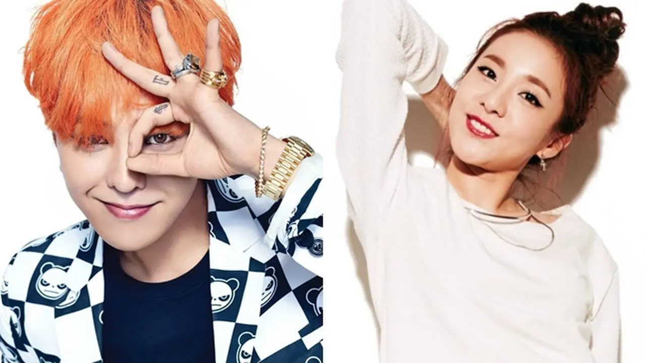 G-Dragon kepergok mencium seorang wanita yang diduga Sandara Park.