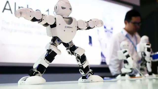 Ilustrasi Robot UBTECH Robotics Corp yang Menari Serempak