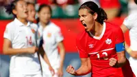 Christine Sinclair adalah pemain Kanada yang mencatatkan diri sebagai pencetak gol wanita terbanyak kedua dunia dengan 161 gol. Sinclair telah bermain di empat Piala Dunia Wanita dan dua olimpiade bersama Timnas Kanada. (AFP/Getty Images/Kevin C. Cox)